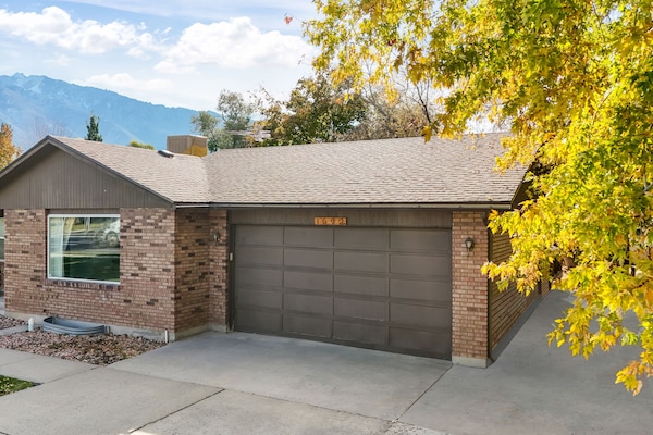 House front view, 2 car garage and outside parking