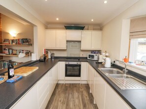 Cottage | Private kitchen | Fridge, dishwasher, cookware/dishes/utensils - Dunes Cottage (Chathill)