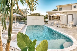 2 outdoor pools, open 7:00 AM to 8:00 PM, pool umbrellas, sun loungers