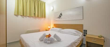 1 habitación y ropa de cama