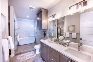 Shower, hair dryer, towels, soap