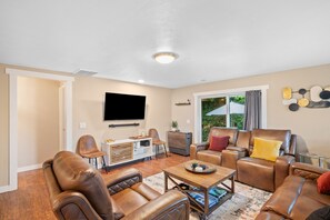 Main home cinema with including a 55" Roku Smart TV, 5.1 Dolby Surround Sound.