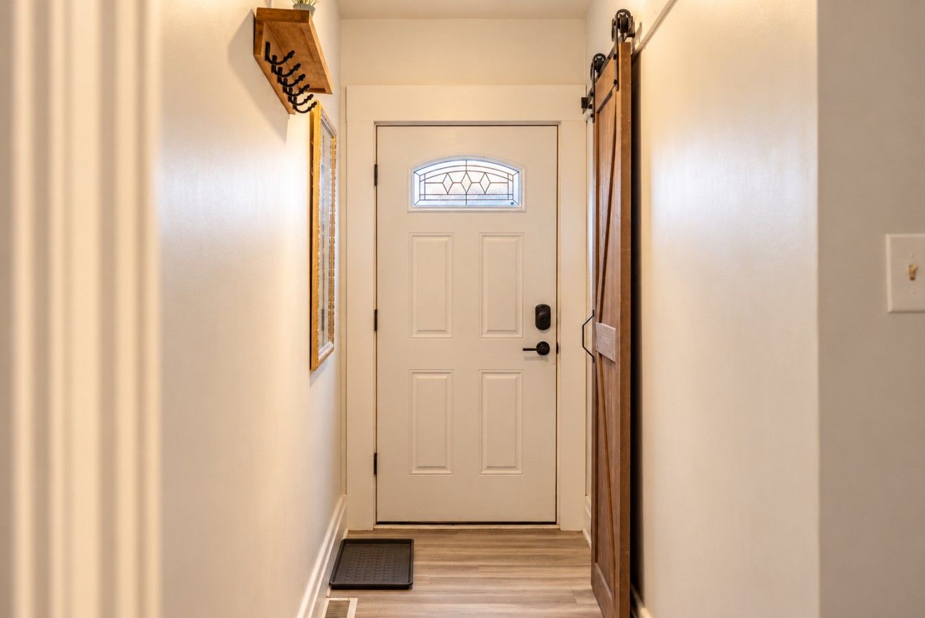 Shed your boots on the tray and hang your jacket on the hooks by the door.