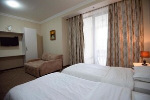 Blackout curtains, free WiFi, bed sheets