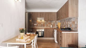 Réfrigérateur, four, plaque de cuisson, cafetière/bouilloire