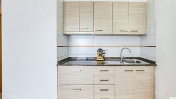 Fridge, microwave, stovetop, coffee/tea maker