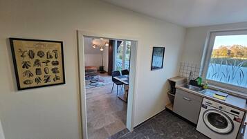 Condo | Private kitchen | Highchair, dining tables