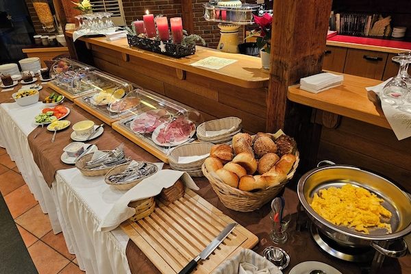 Daily buffet breakfast (EUR 12 per person)