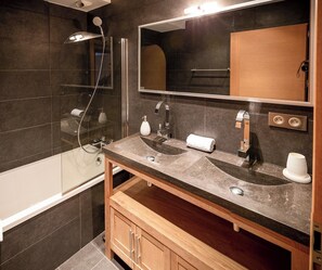 Bathtub, hair dryer, towels