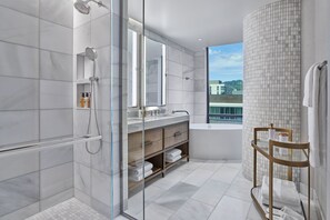 Separate bathtub and shower, hair dryer, bathrobes, slippers - The Ritz-Carlton, Portland (Portland)