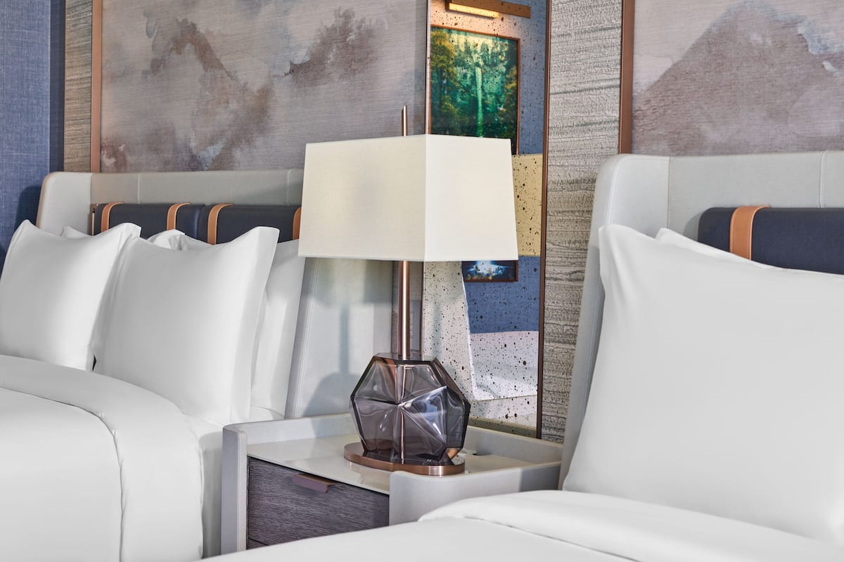 Premium bedding, down comforters, pillowtop beds, in-room safe