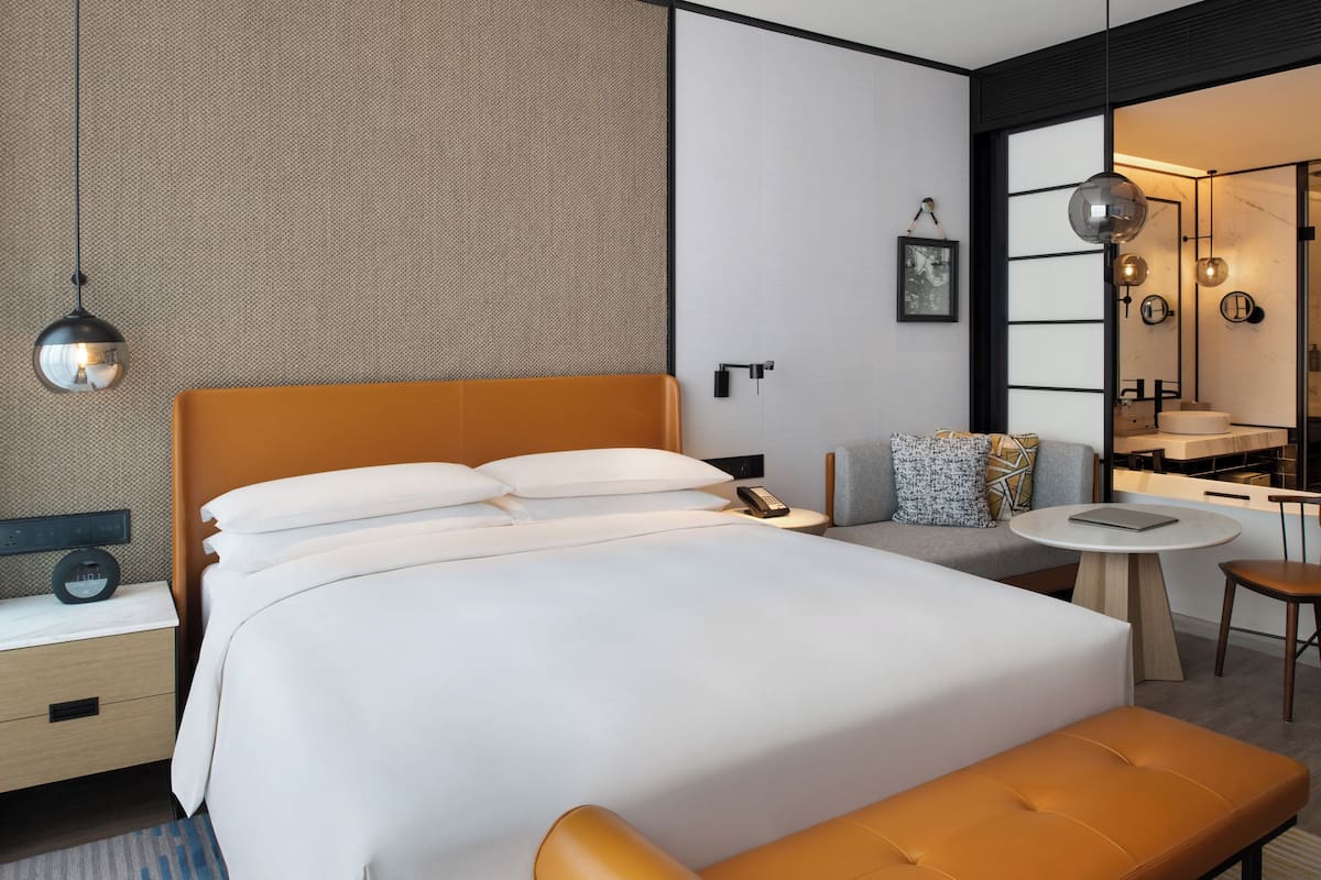 Premium bedding, down duvets, minibar, in-room safe