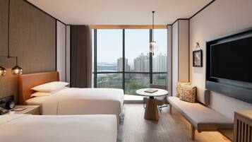 Ropa de cama de alta calidad, cubrecamas y minibar