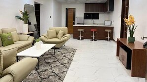 Royal Villa, 4 Bedrooms, Accessible, Pool Access | Living area - Aurora Villas and Cabin Resort (Mabalacat City)