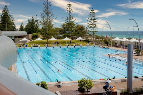 Family Escapade: Shops Beach and Sun Await
