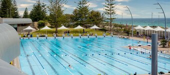 Family Escapade: Shops Beach and Sun Await