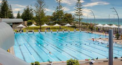 Family Escapade: Shops Beach and Sun Await