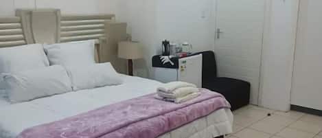 Premium bedding, down comforters, Tempur-Pedic beds, minibar