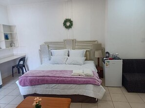 Premium bedding, down duvets, Tempur-Pedic beds, minibar