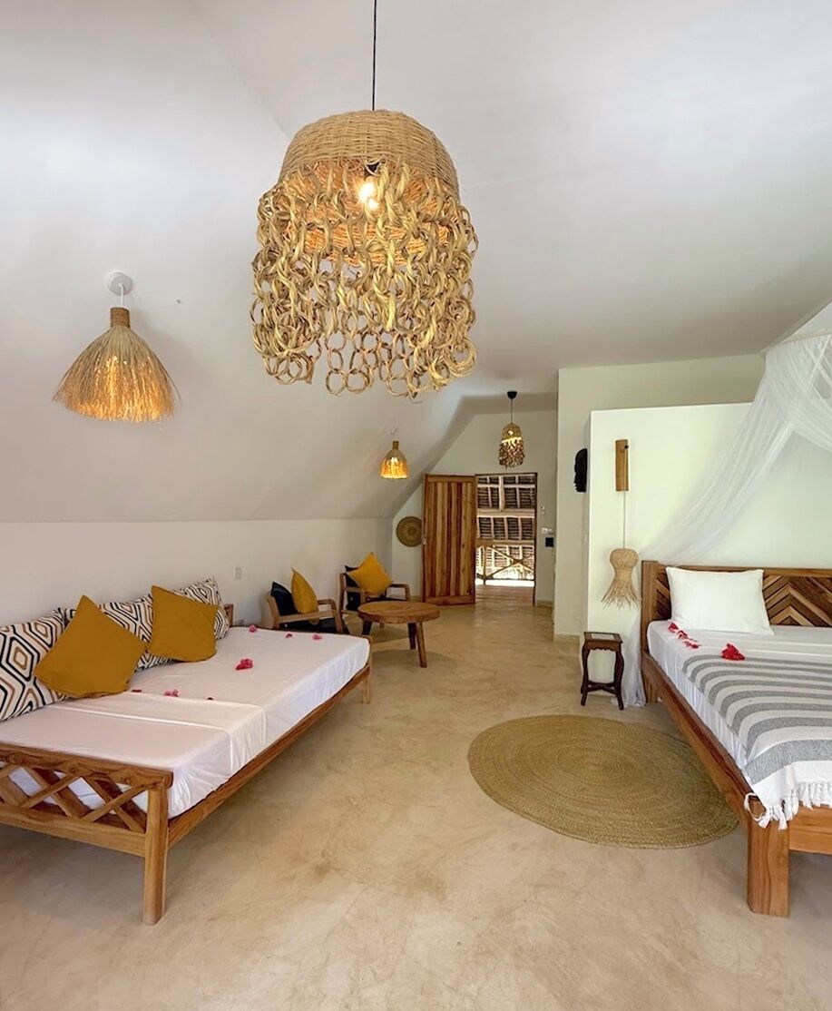 Tripla Deluxe, 1 camera da letto, non fumatori, vista giardino | Una cassaforte in camera, lenzuola