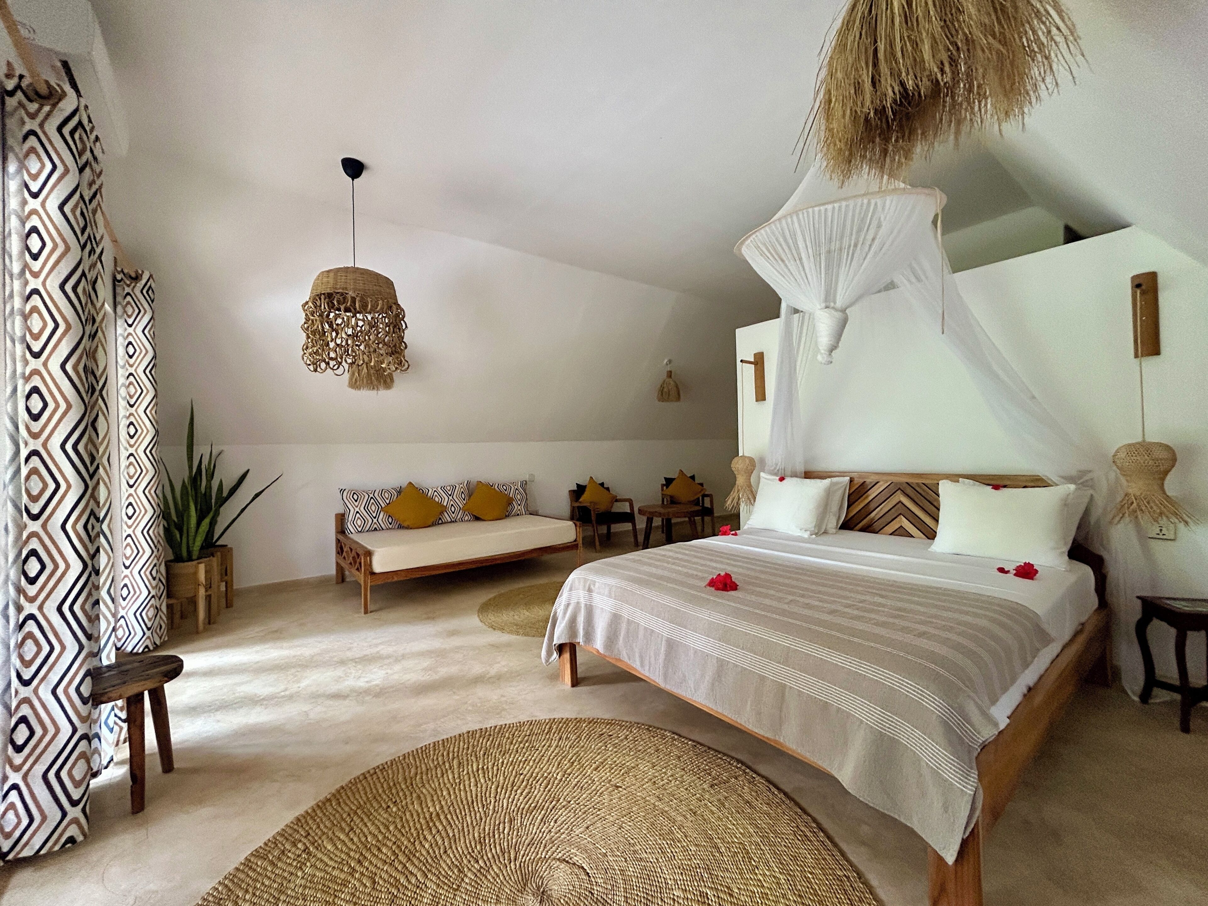 Deluxe Triple Room, 1 Bedroom, Non Smoking, Garden View | In-room safe, bed sheets