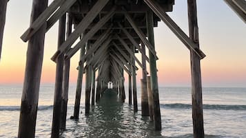 On the beach, sun-loungers