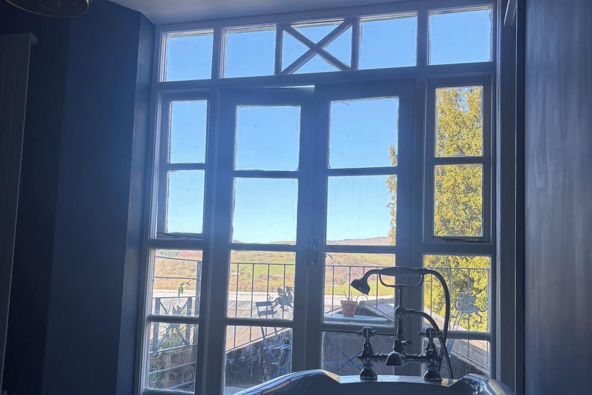 Deluxe Double Room, Mountain View | Bathroom | Designer toiletries, hair dryer, slippers, towels