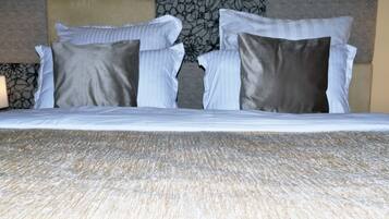 Desk, laptop workspace, free WiFi, bed sheets