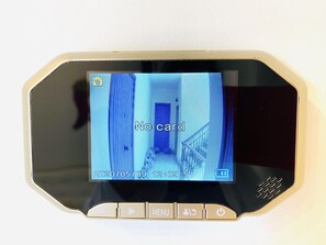 A digital lock with a screen displaying 'No card' and a date/time stamp.