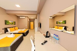 Family Room, Balcony, Garden View | Premium bedding, minibar, in-room safe, desk