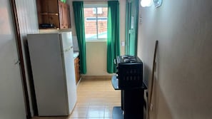 Standard Apartment, 1 Bedroom, Private Bathroom, Courtyard View | Private kitchen | Full-size fridge, oven, dishwasher, electric kettle - El Rinconcito Iguazú (Puerto Iguazú)