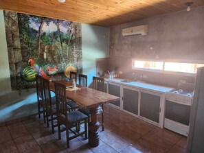 Standard Apartment, 2 Bedrooms, Private Bathroom, Courtyard View | Private kitchen | Full-size fridge, oven, dishwasher, electric kettle - El Rinconcito Iguazú (Puerto Iguazú)