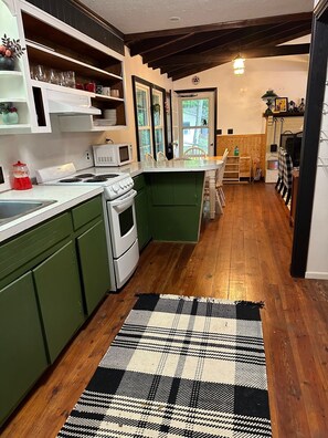 Microwave, toaster, cookware/dishes/utensils, ice maker