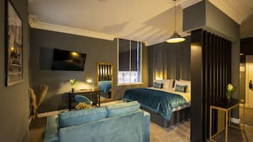 Deluxe Studio Suite | Premium bedding, pillow-top beds, desk, soundproofing