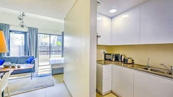 In-room safe, desk, laptop workspace, blackout curtains