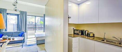 In-room safe, desk, laptop workspace, blackout curtains