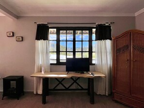 Suíte luxo | Vista para o jardim