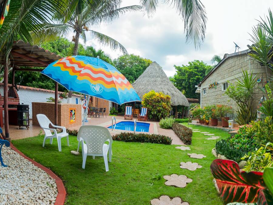 Outdoor pool, pool umbrellas, sun loungers