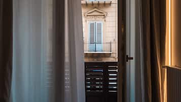 Deluxe Room, 1 Bedroom, Balcony | Minibar, in-room safe, individually decorated, individually furnished