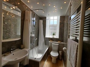 Hair dryer, towels, soap, shampoo
