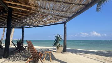 On the beach, white sand, sun-loungers, scuba diving