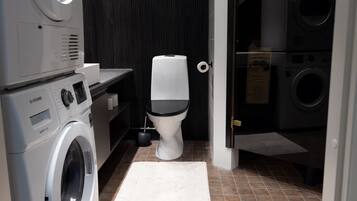 Exclusive Apartment | Bathroom | Shower, hair dryer, towels, soap