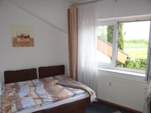 2 bedrooms, desk, iron/ironing board, travel crib