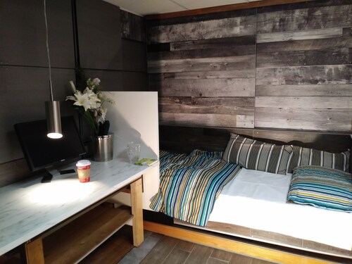 BASEMENT APARTMENT (1 Bedroom-2 Beds)