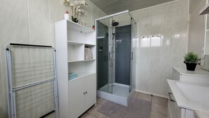Shower, hair dryer, towels, soap