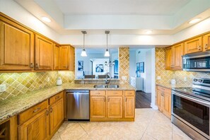 Fridge, microwave, oven, stovetop - Updated Pelican Bay Condo - Private Beach & Pool (Naples)
