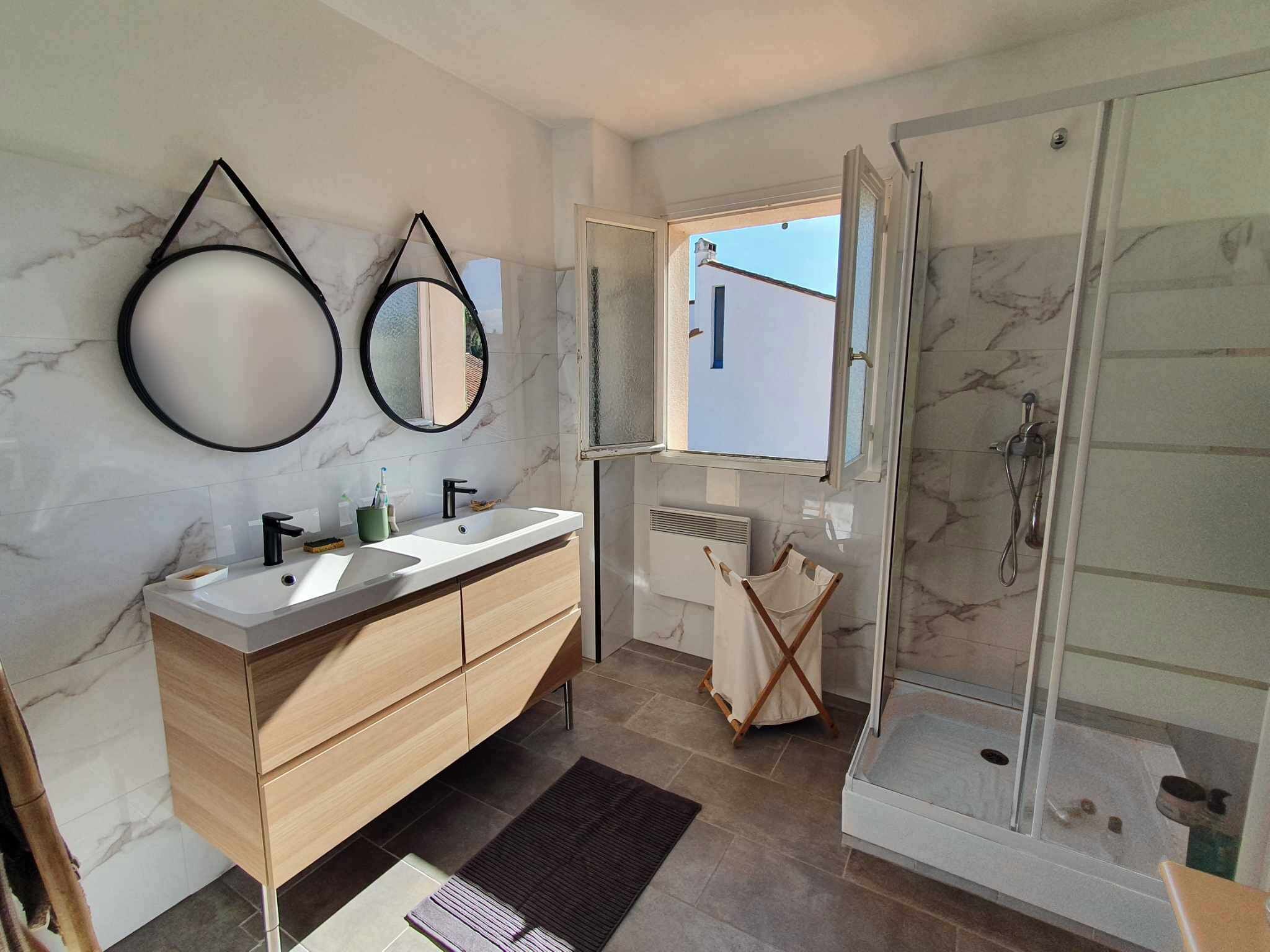 Shower, hair dryer, towels, toilet paper