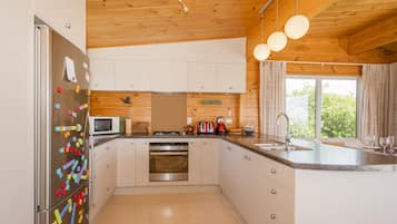 Fridge, microwave, toaster, cookware/dishes/utensils