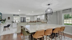 Fridge, microwave, oven, stovetop - Spacious Lakefront Home | Pool | Hot Tub | Fire Pit | Games (Piney)