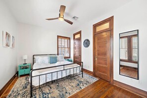 1 bedroom, desk, iron/ironing board, travel crib